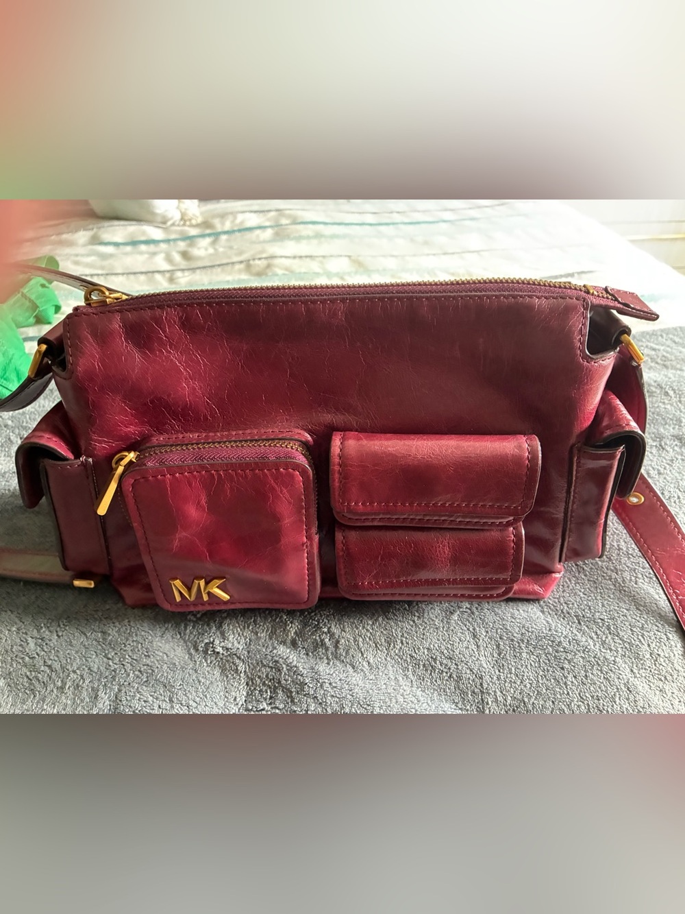 Michael Kors Burgundy Leather Crossbody with Front Pockets and Gold Accents